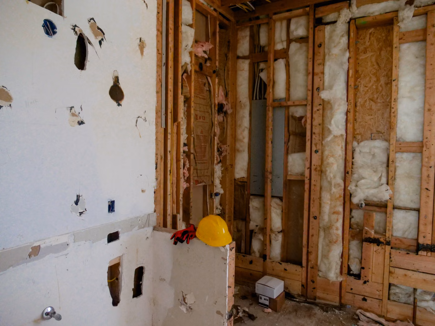 Interior room stripped to framing during demolition for renovation